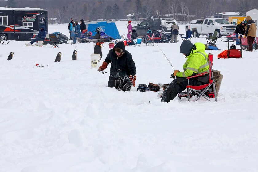 Anglers fish during the Cuyuna Lakes Ice Fishing Contest.
