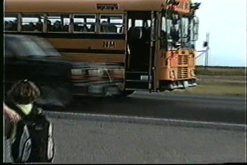 On her first day of school, Star Pitlick (left) is about to board the school bus as this vehicle passes on the shoulder. Today, Pitlick is a senior at Pine River-Backus and the thought of this day gives her the chills. Submitted photo
