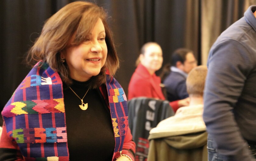 Senator Patricia Torres Ray walking with