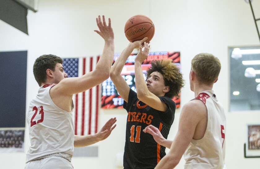 Willmar boys basketball v St. Cloud Tech 030723 009.jpg