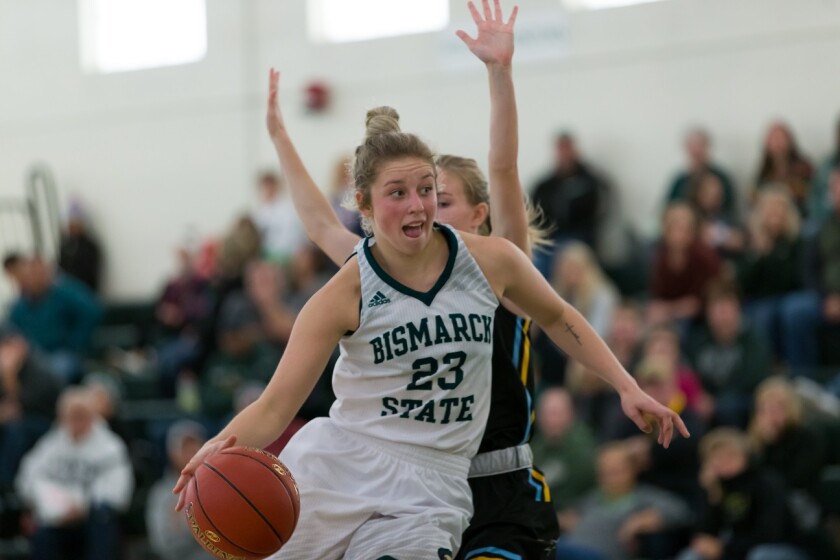 Bismarck State freshman guard Sydney Andersen drives by a Sheridan College (Wyo.) defender on Saturday, Nov. 17, from the Bismarck State College Armory. (Photo submitted by Dee Bertsch/Bismarck State College)