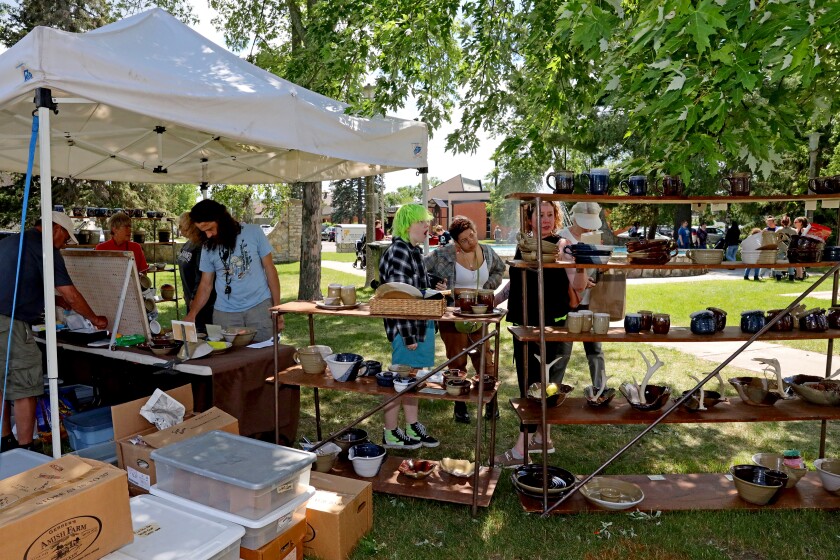 People attend Arts in the Park on Sunday, June 26, 2022, at Gregory Park in Brainerd.