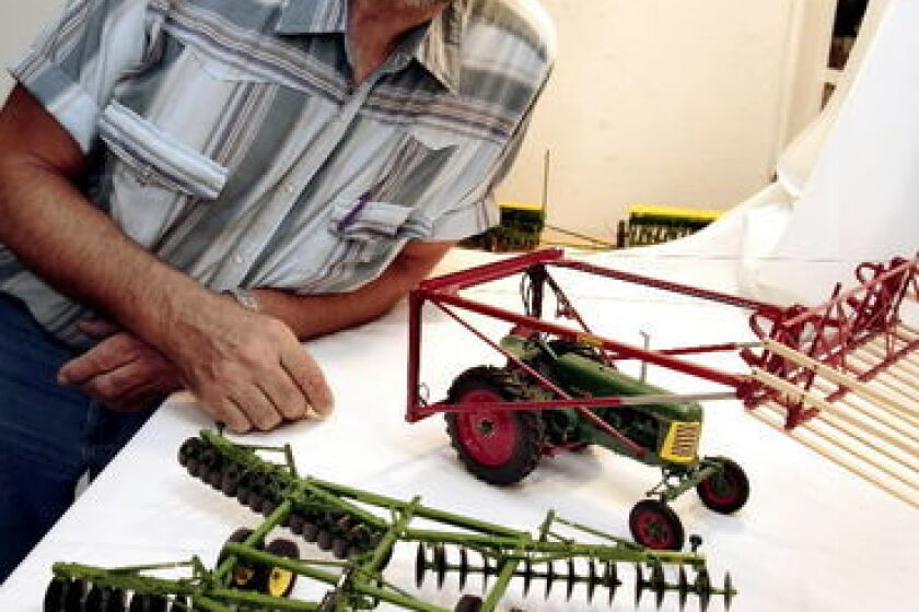 Farm implement model maker has eye for small details - Grand Forks ...