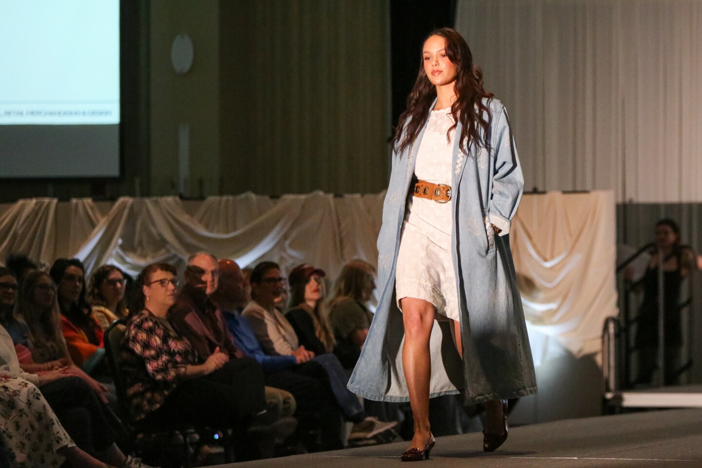 A model walks the runway at the Show Your Work: A Look Behind the Seams fashion show on Wednesday, April 30, 2025, at the Oceti Sakowin Ballroom in Memorial Union.