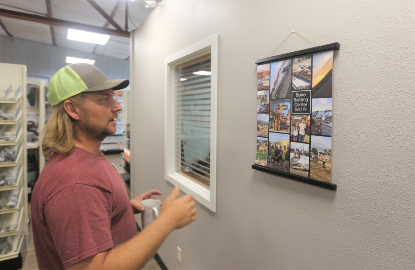 Burke built Town's lumberyard is community's beacon one year after