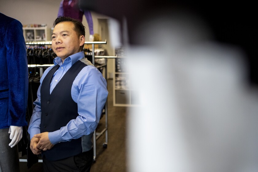 Emporia Suits and Alterations owner Sean Yang talks about his new store located in Willmar along 1st Street on Thursday, April 28, 2022.