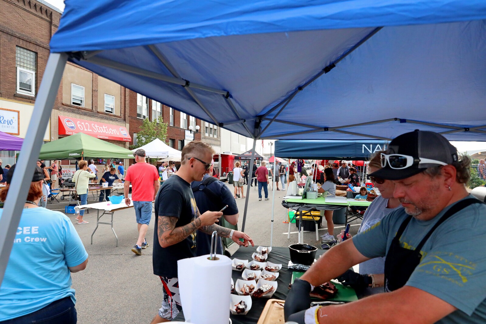 People enjoy the Cub Foods Ribfest during Brainerd Jaycees Street Fest on Saturday, July 23, 2022, in downtown Brainerd.