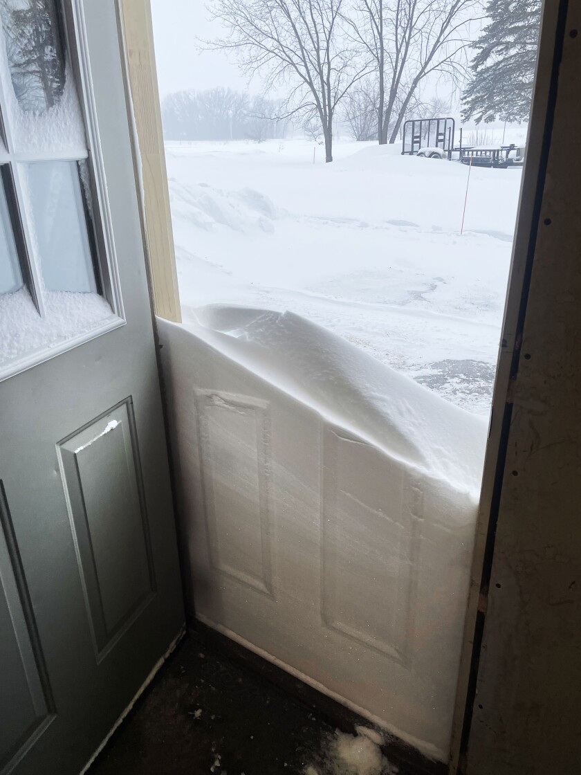 Snow outside of door