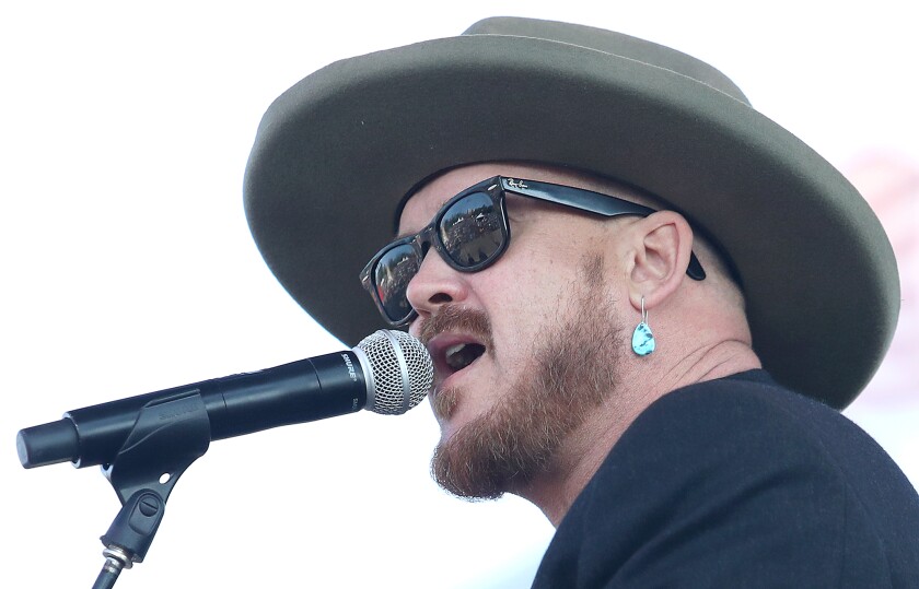 David Huckfelt sings from the stage at Bayfront Park