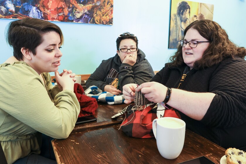 people knitting