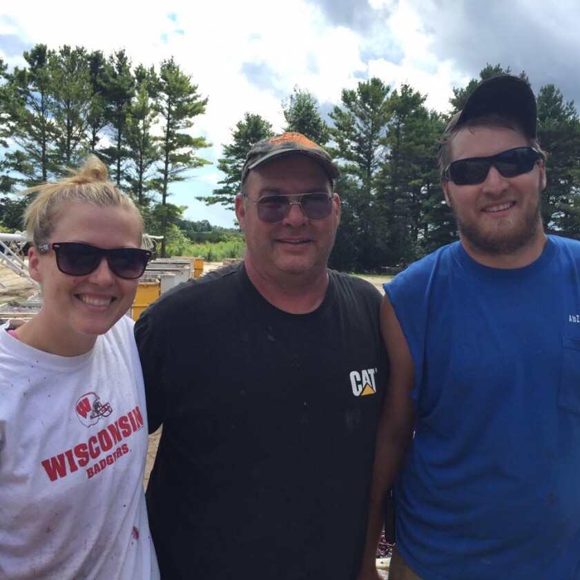 Jen Zettel-Vandenhouten, left, with her dad, John Zettel, and brother, Robert Zettel