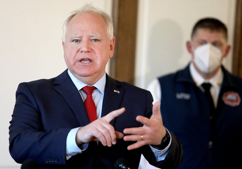Minnesota Governor Tim Walz speaks to the press