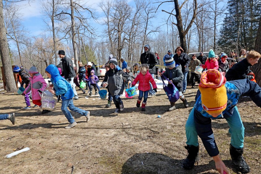 Families enjoy the Annual Lake Shore Easter Egg Hunt Saturday, April 17, 2022, at Fritz Loven Park.