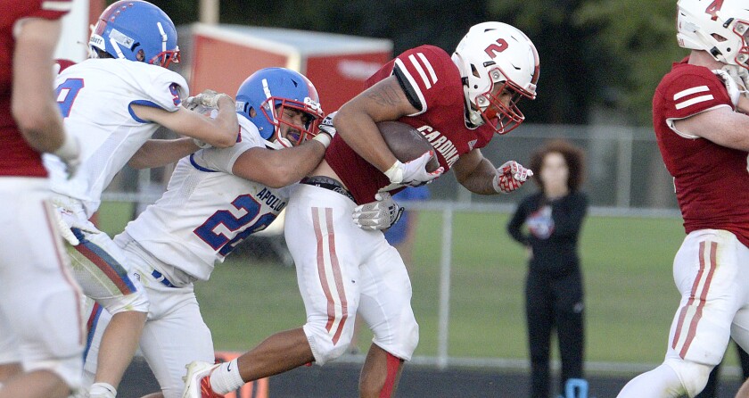 Willmar junior Ramero Trevino, 2, fights for extra yards during a North Central White District game against St. Cloud Apollo on Friday, Sept. 2, 2022 at Hodapp Field in Willmar.
