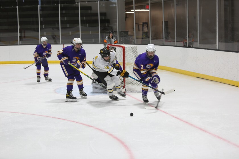 The skater loses his stick