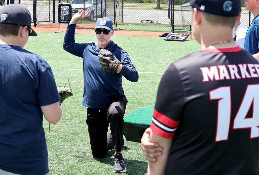Pitcher shows drill.