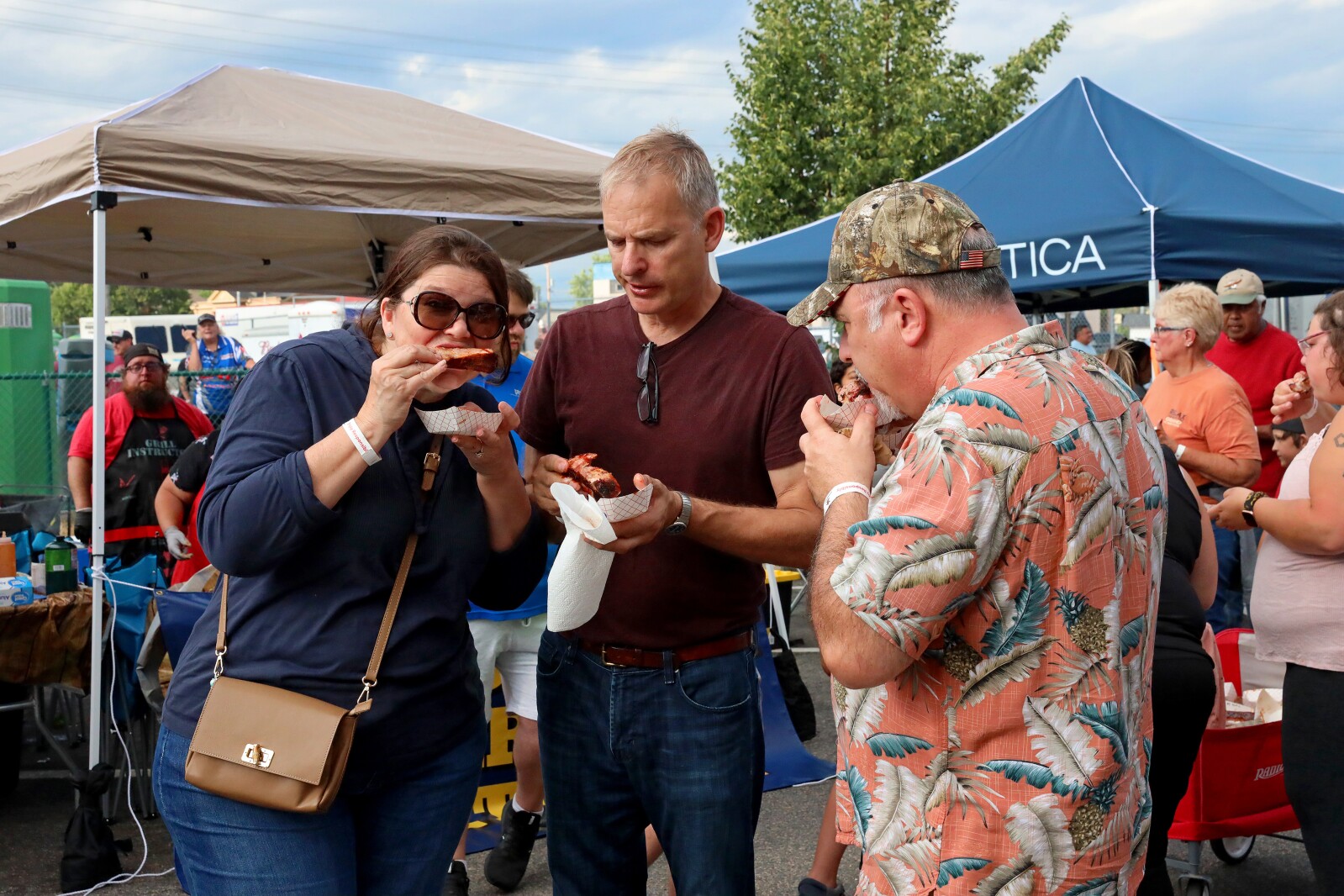 People enjoy the Cub Foods Ribfest during Brainerd Jaycees Street Fest on Saturday, July 23, 2022, in downtown Brainerd.
