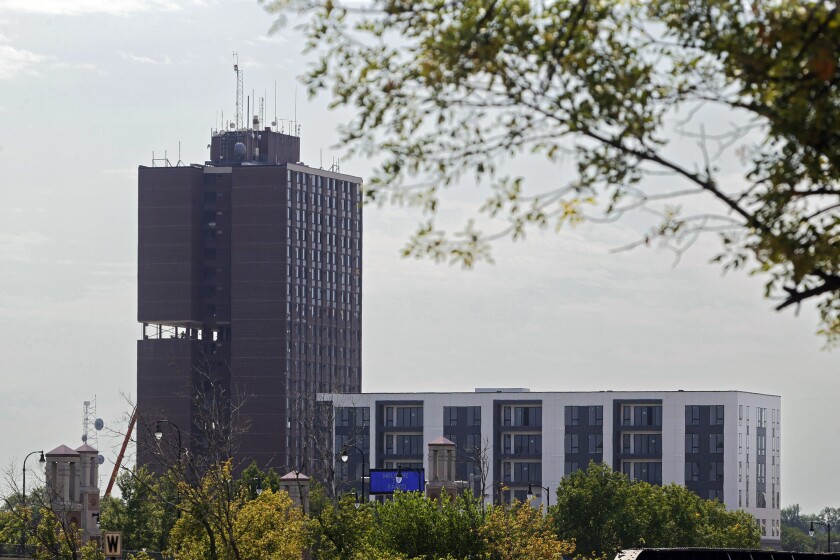 Sky peeks through Fargo high-rise as it's stripped down ahead of ...