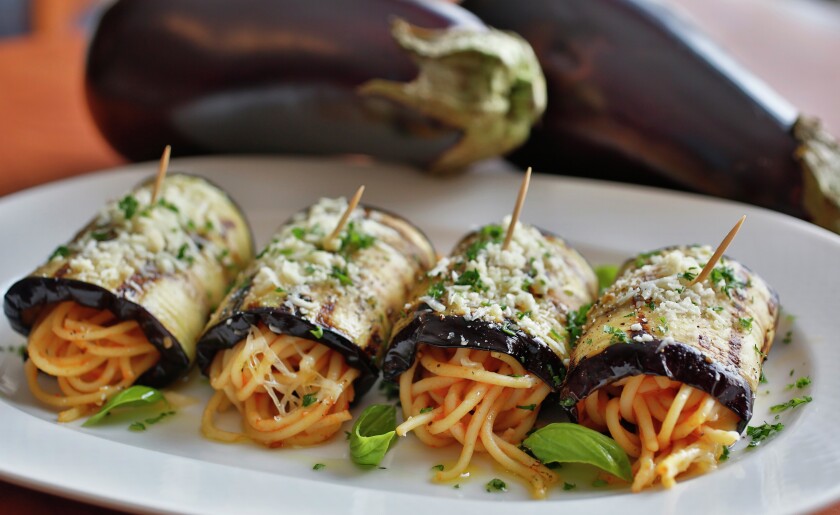 Grilled eggplant rolls feature eggplant, spaghetti, tomato sauce, fontina, Romano and Parmesan cheeses. David Samson / The Forum