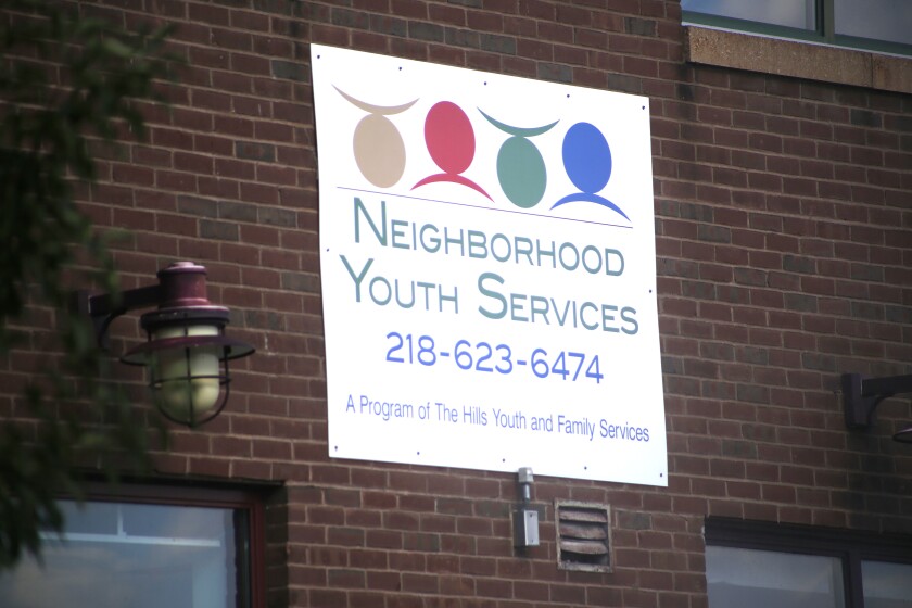 Neighborhood Youth Services sign.