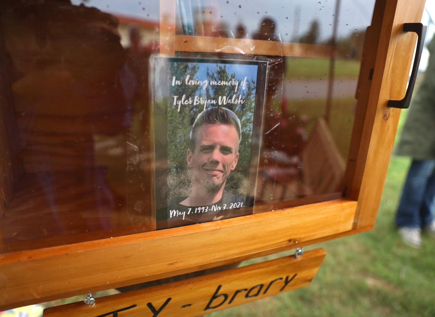 A photo of Tyler Walsh inside the Ty-brary.