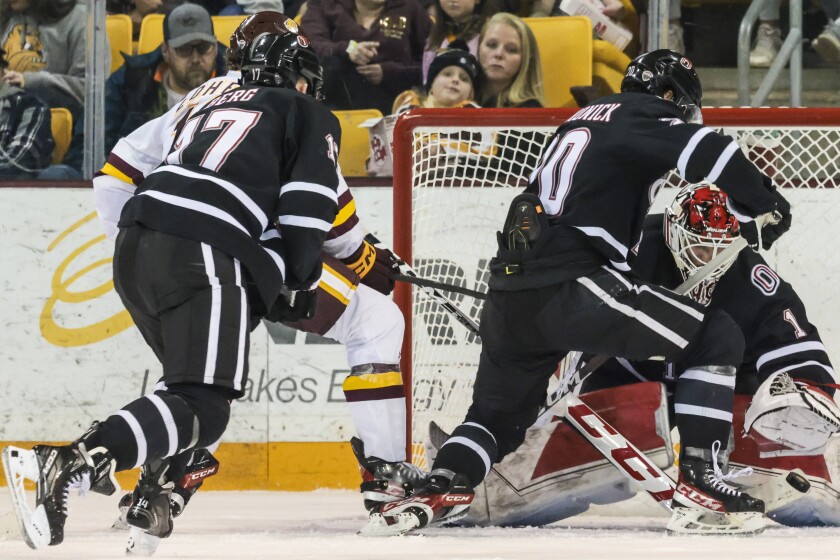 college men playing hockey