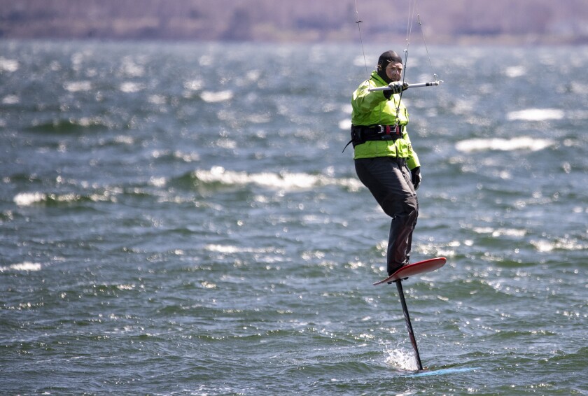 Loretto's Eric Spottke kitesurfs along Green Lake outside Spicer on Saturday, May 7, 2022.