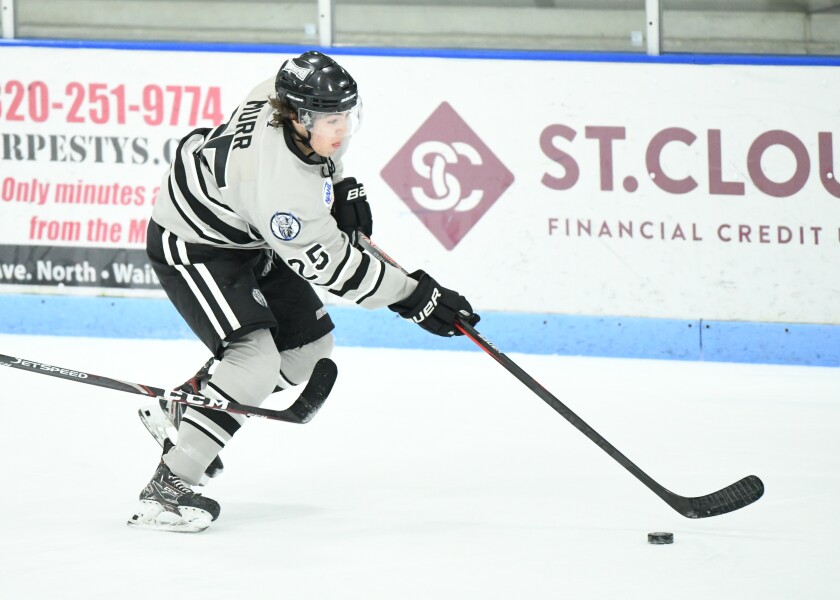 Evan Murr puck.jpg