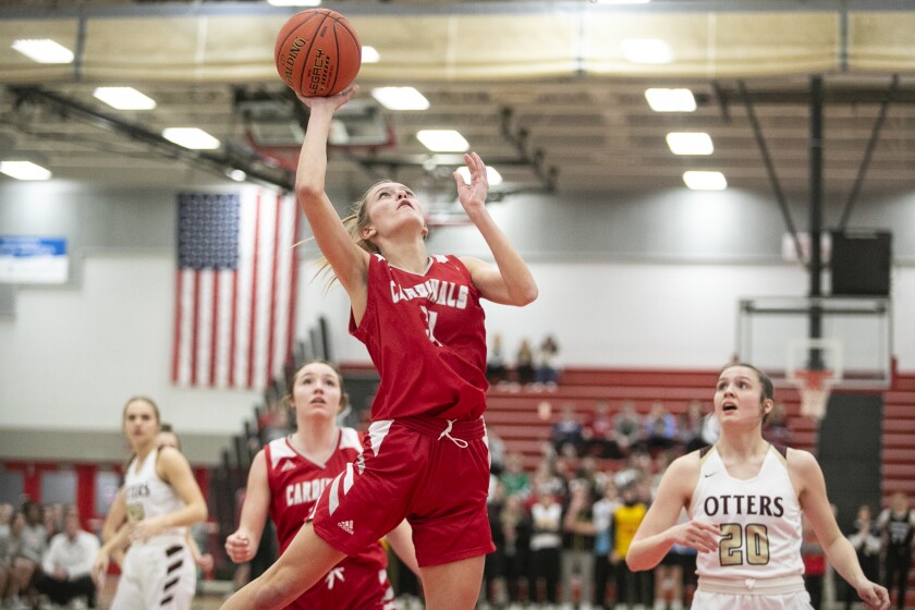 Willmar senior Jaida Reiman takes an open shot at the basket as the Cardinals played host to the Fergus Falls Otters Feb. 17, 2022.