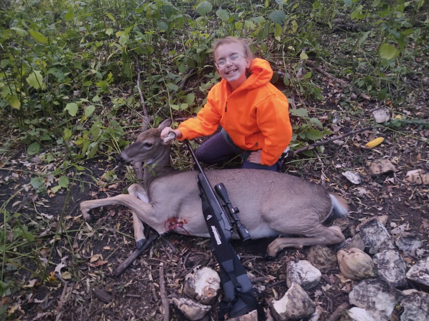Zoey Lafferty first deer.jpeg