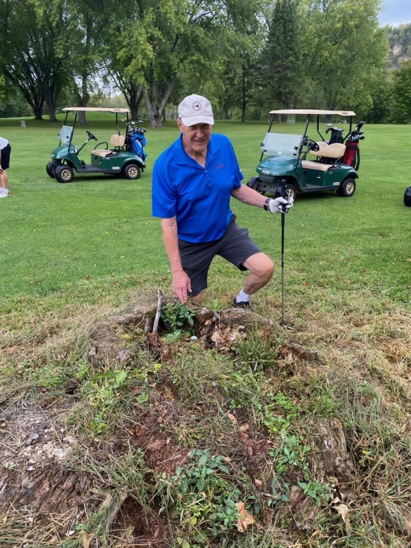Dr. John Gorton finds a not-so-welcoming lie on the 18th fairway of Mississippi National Golf Links in Red Wing during the "Up North Golf Trip" in 2021.