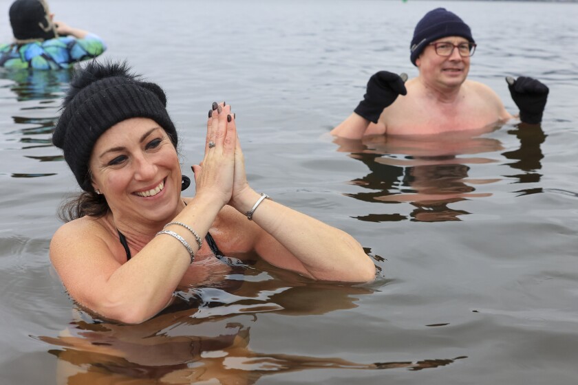 people swim in cold water in December