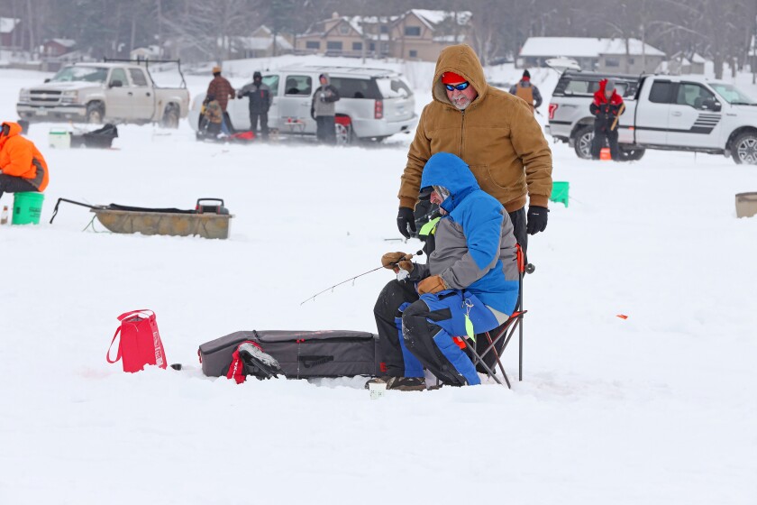Anglers fish during the Cuyuna Lakes Ice Fishing Contest.