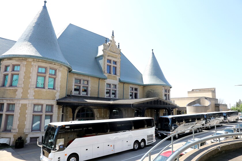 Buses that brought cruise ship passengers to the Depot wait outside