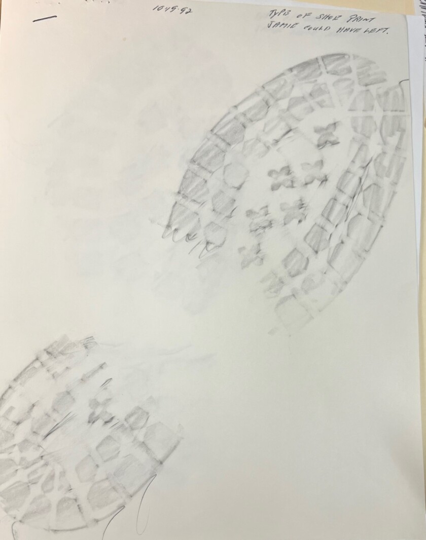 A traced shoe print.