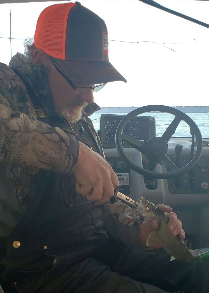 010822.O.GFH.EDSBAIT-Dan Bonham fishing.jpg