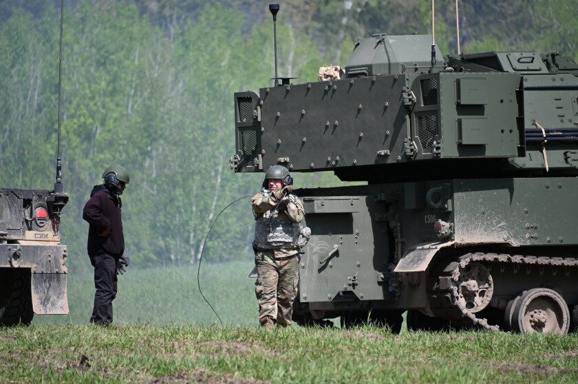 Crews training at Camp Ripley test a howitzer.