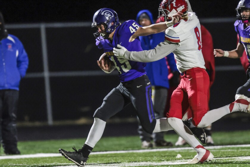 high school boys playing football