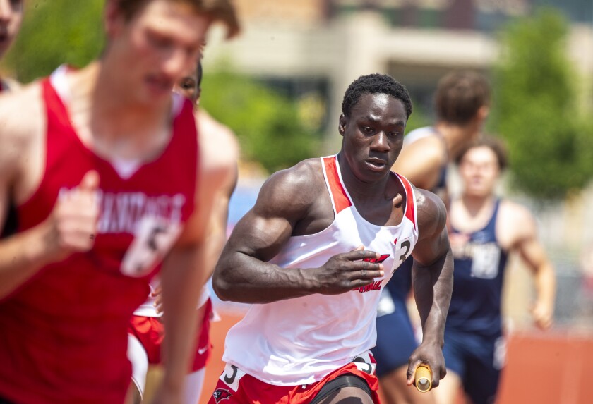 Joseph Kallevig competes for the Willmar Cardinals in the boys 4x400 during the Class AA state track and field championships at St. Michael on Saturday, June 11, 2022.