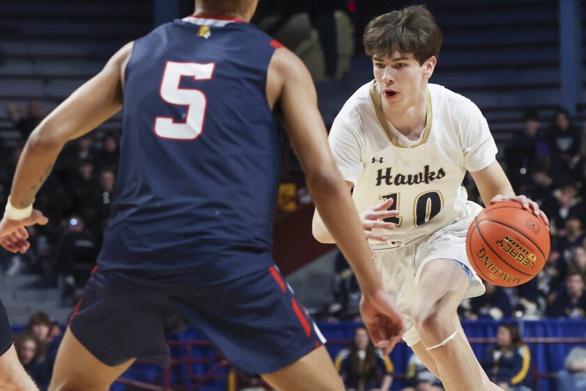 high school boys play basketball