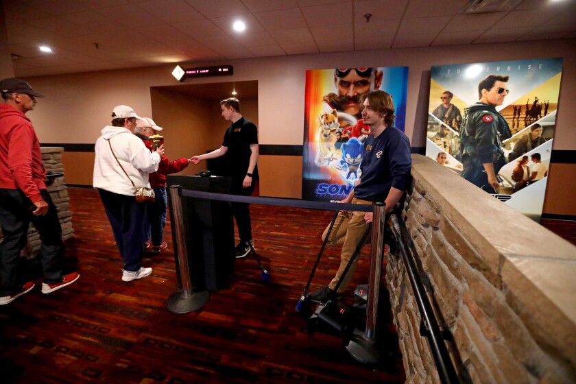 People go to the movies at Lakes 12 Theatre.