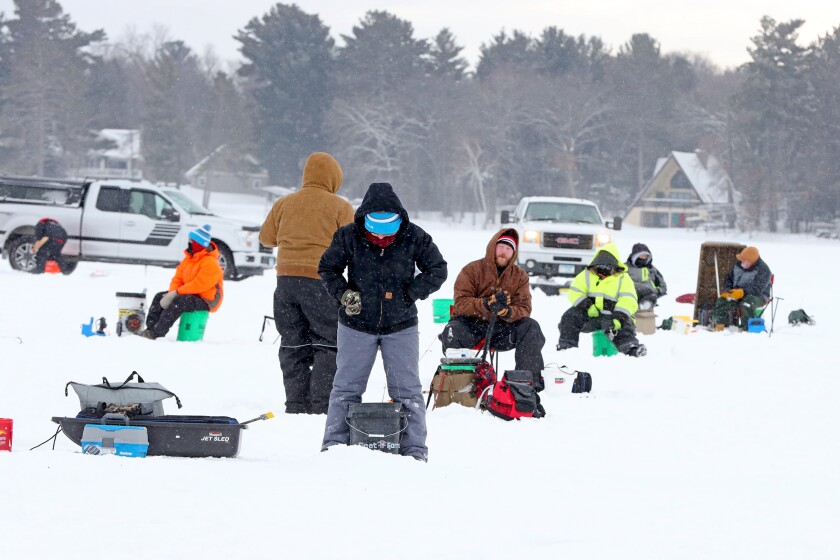 Anglers fish during the Cuyuna Lakes Ice Fishing Contest.