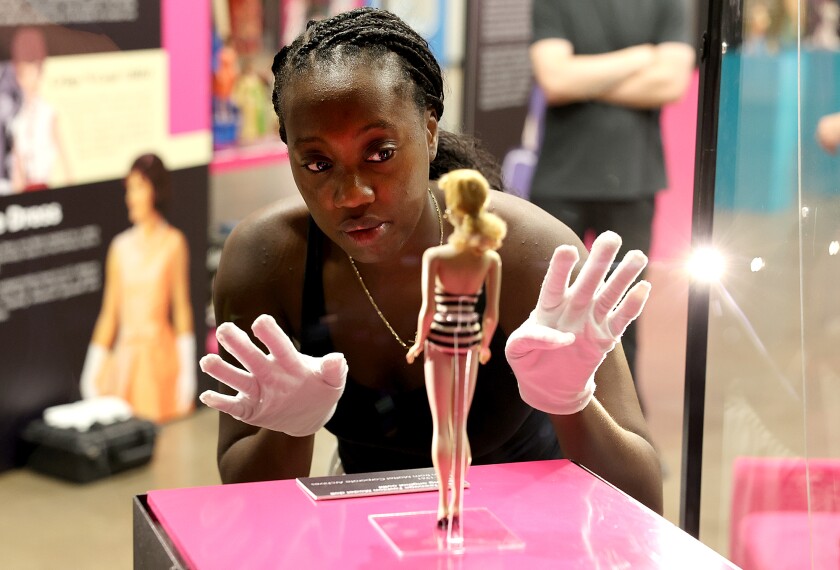 Stylist works on Barbie.