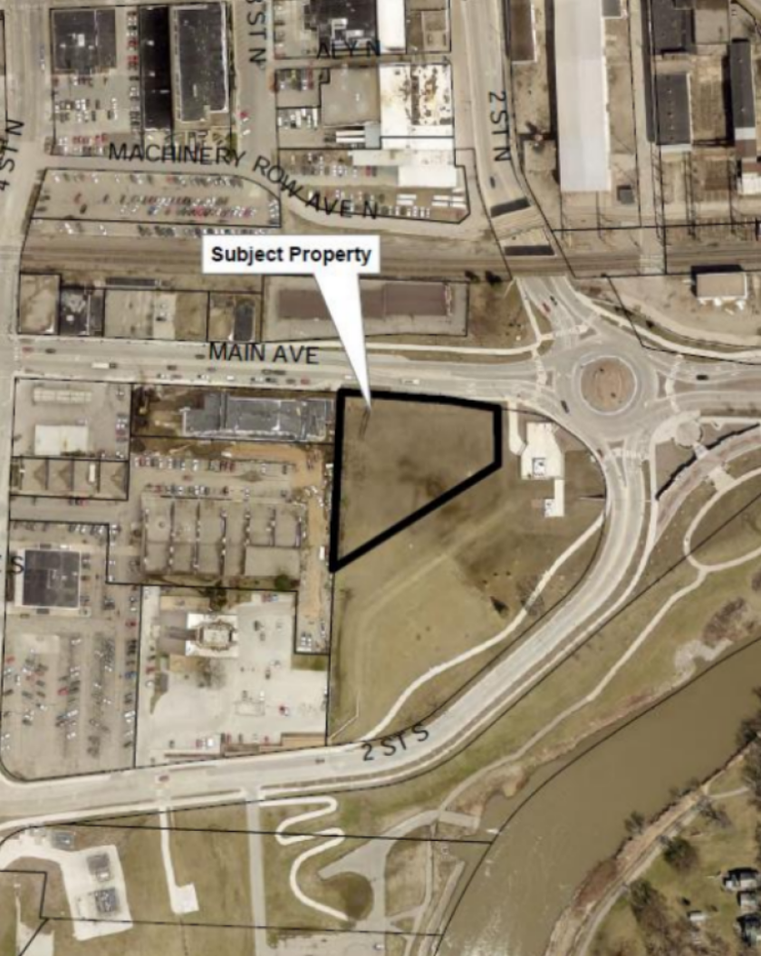 An aerial map shows a plot of land at the intersection of Second Street and Main Avenue.