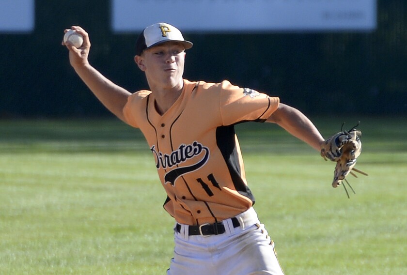 Paynesville Pirates shortstop Grayson Fuchs sets to make a throw to first base during a Region 4C elimination game against the Willmar Rails on Monday, Aug. 8, 2022 at Green Lake Diamonds in Spicer.