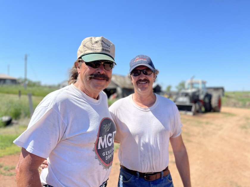 Dale Heid, left, and his son Branden. 