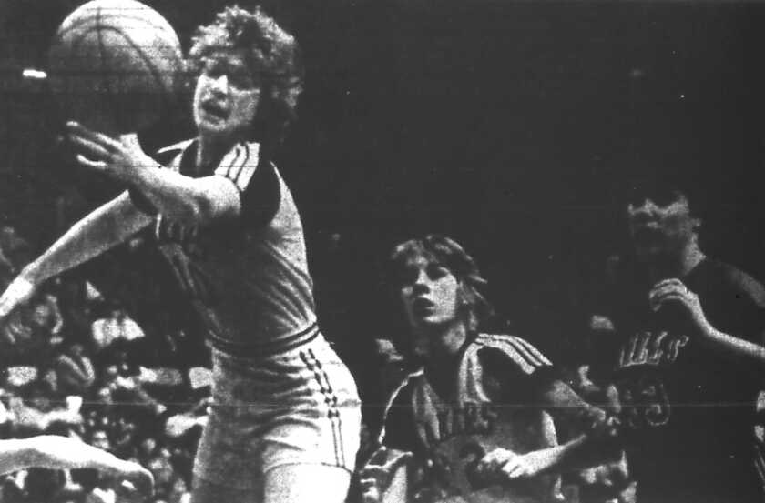 Player reaches for the ball