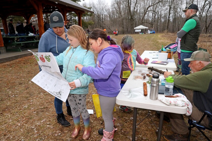 Earth Day activities at Rotary Riverside Park in Brainerd.