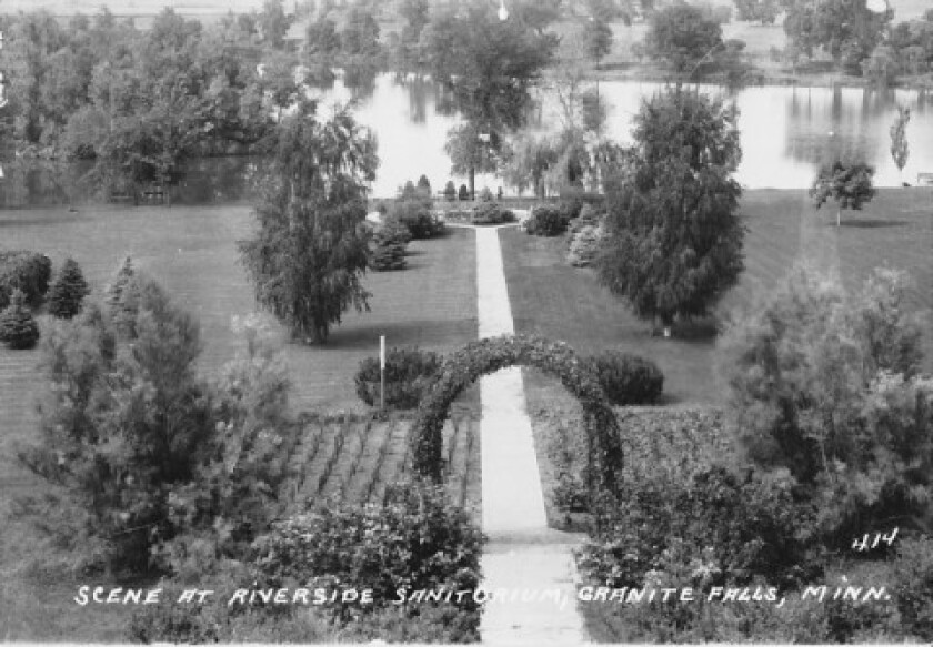 A view of the "back yard" of the Riverside Sanatorium leading to the banks of the Minnesota River near Granite Falls. The beautifully landscaped campus was part of the Riverside story from its start in 1917, as its first administrators devoted great attention to making the building and grounds comfortable and attractive for its patients and workers.