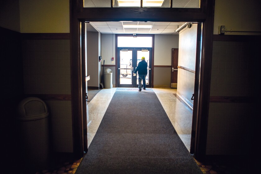 Jason Kowalczyk departs the Willmar Education & Arts Center after receiving free COVID-19 testing kits